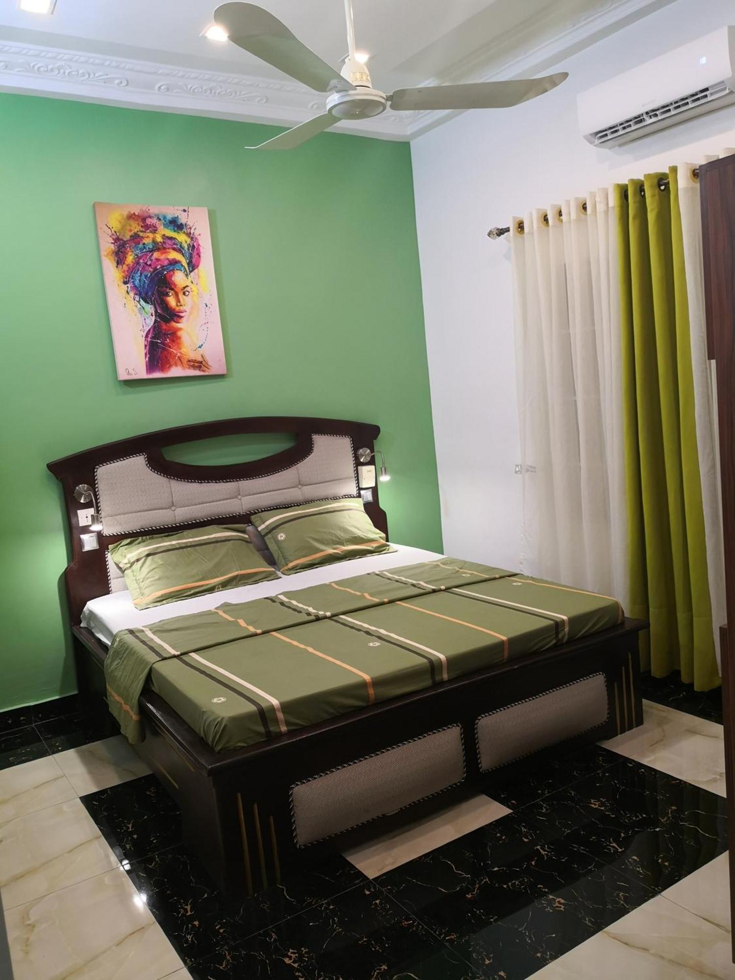 Residence Palais Du Stade Cotonou Rum bild